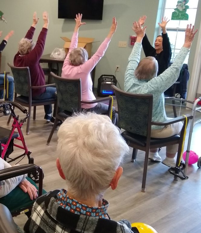 seniors hands in the air