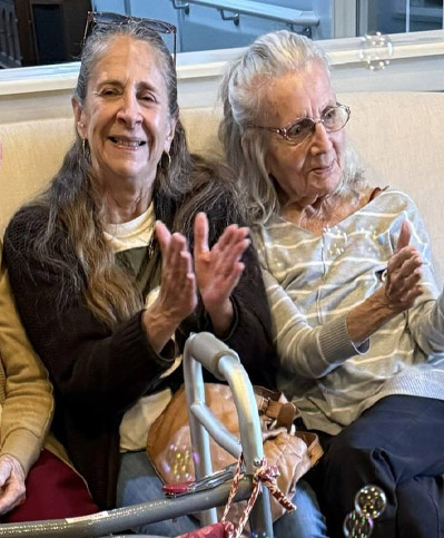 two old ladies enjoying bubbles